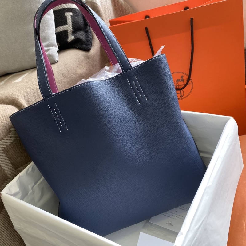 H**mes shopping bags